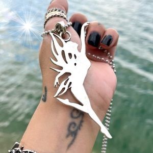 Silver fairy shape necklace on military ball chain . Bohemian celtic ornaments